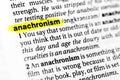 Highlighted English word `anachronism` and its definition in the dictionary Royalty Free Stock Photo