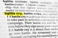 Highlighted English word `battle cry` and its definition in the dictionary