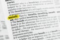 Highlighted English word benefit and its definition at the dictionary. Royalty Free Stock Photo