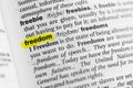 Highlighted English word freedom and its definition at the dictionary Royalty Free Stock Photo