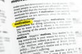 Highlighted English word motivation and its definition at the dictionary. Royalty Free Stock Photo