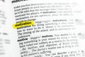 Highlighted English word `motivation` and its definition at the dictionary Royalty Free Stock Photo