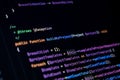 Highlighted programming function with PHP syntax and color-coded variables shown on dark screen for developing project-based Royalty Free Stock Photo