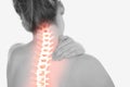 Highlighted spine of woman with neck pain