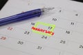 highlighter with a circled anniversary day on calendar Royalty Free Stock Photo