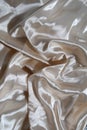 Highlights on silk fabric, light colors, beige, white