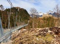 Highline 179 longest 406 meters rope bridge in the world in Alps mountains. Tyrol, Austria. Royalty Free Stock Photo