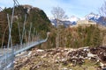 Highline 179 longest 406 meters rope bridge in the world in Alps mountains. Tyrol, Austria. Royalty Free Stock Photo