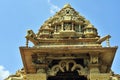 Highly ornate carved entrance gate and shikhara of Kandariya Mahadeva Temple