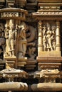 Highly ornate carved sculptures on the wall of Jagadambi Temple