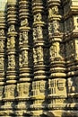 Highly ornate carving on the wall of Duladeo Temple at Khajuraho