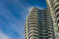 A highrise building against the blue sky. Condominium or apartment building. Architecture details Royalty Free Stock Photo