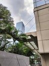 Highrise Building in the Jungle of Concretes With Deep Blue Sky Royalty Free Stock Photo