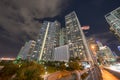 Highrise buildings on Brickell shot from the bridge. Long exposure photo with motion blur in clouds