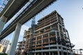 Highrise construction site at Brickell Miami near elevated Metrorail tram tracks Royalty Free Stock Photo