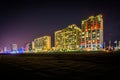 Highrise hotels on the oceanfront at night, in Virginia Beach, V