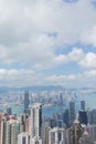 Highrise modern buildings with blue sky in the city at Victoria`s Peak, Hong Kong Royalty Free Stock Photo