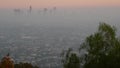 Highrise skyscrapers of metropolis in smog, Los Angeles, California USA. Air toxic pollution and misty urban downtown skyline. Royalty Free Stock Photo