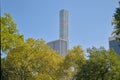 432 Park Avenue skyscrapers peeking over the trees of Central Park, New York