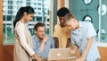 Highschool boy presenting project while teacher looking at laptop. Edification. Royalty Free Stock Photo