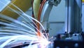 A highspeed camera capturing the rapid movements of a robotic hand assembling minute electronic circuits blurring the