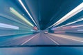 Highspeed drive in a tunnel, driving on the fast lane as concept for highspeed with colorful concept of the teal and