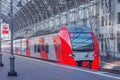 Highspeed train stands by the platform.