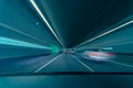Highspeed tunnel drive - colorful teal and orange concept for racing through the night in a tunnel with motion blur