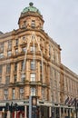 A highstreet building with Christmas decirations on