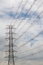 Hight Voltage Pole and The Blue Sky with Clouds. Royalty Free Stock Photo