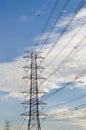 Hight Voltage Pole and The Blue Sky with Clouds. Royalty Free Stock Photo