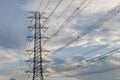 Hight Voltage Pole and The Blue Sky with Clouds. Royalty Free Stock Photo