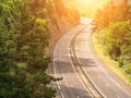 Highway across forested landscape