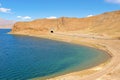 Highway along the mountain lake in Tibet