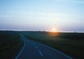 Highway on the background of a sunset.