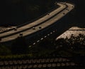 Highway bridge illuminated at twilight with the Rias Baixas below illuminated by the sun and the TaragoÃÂ±a