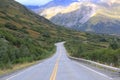 Long highway winding its way down hill Royalty Free Stock Photo