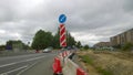 Highway construction and repair. Plastic red and white heavy duty water filled road barrier. Providing security and crowd or traff