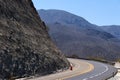 Highway curve with shoulders, in arid zone of Mexico during a sunny day