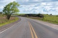 Highway cutting through rural landscape Royalty Free Stock Photo