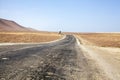 Highway through the desert next to the ocean in National Park Paracas in Ica, Peru Royalty Free Stock Photo