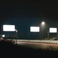 A highway full of sparking neon signs that flicker in the darkness of the night. Blank empty billboard mock up. AI Royalty Free Stock Photo