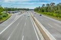 Highway in Germany, multilane Autobahn with parking area Royalty Free Stock Photo