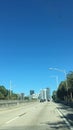 Highway heading to the amusement parks. cars. road. Cityscape.