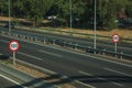 Highway with heavy traffic and SPEED LIMIT signs in Madrid