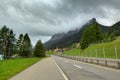 Highway among hills and mountains in Switzerland. Royalty Free Stock Photo