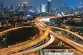 Highway interchanged with city downtown night view Royalty Free Stock Photo
