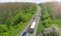 Highway intercity traffic  with truck and cars. Transport logistic background. Royalty Free Stock Photo