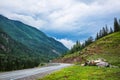 A highway in the intermountain valley. Ongudaysky district, Altai Republic Royalty Free Stock Photo