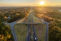 Highway intersection in American rural area. Elevated interchange lanes for express passing of car traffic Royalty Free Stock Photo
